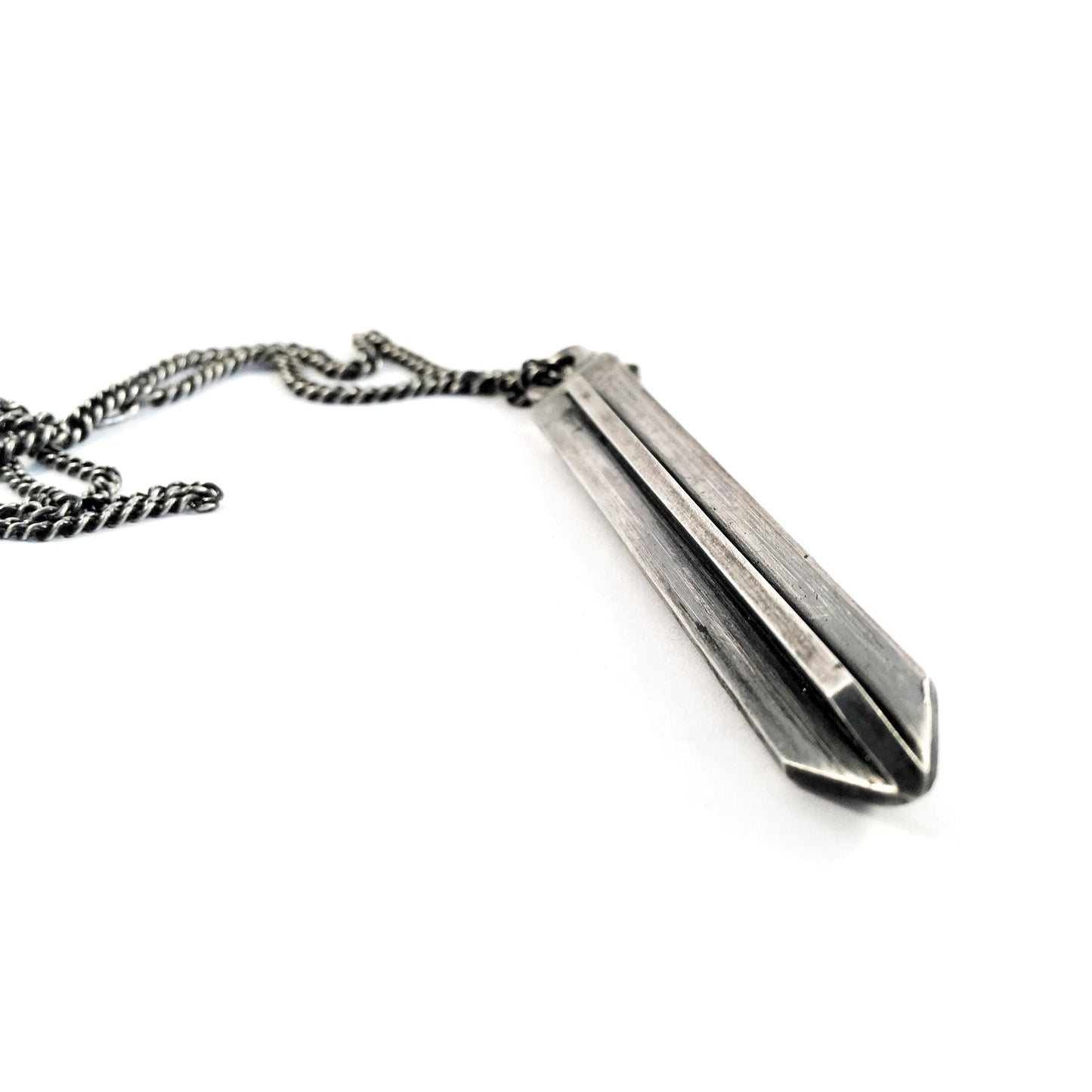 Solid silver arrow head pendant