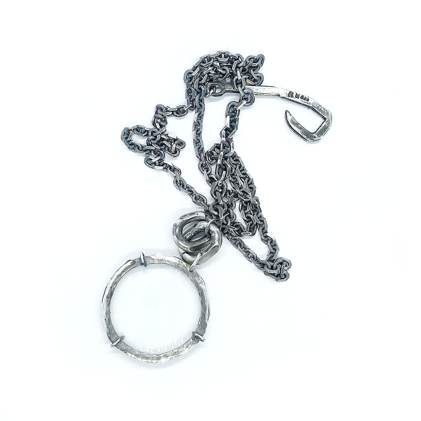 Magnifying glass silver pendant