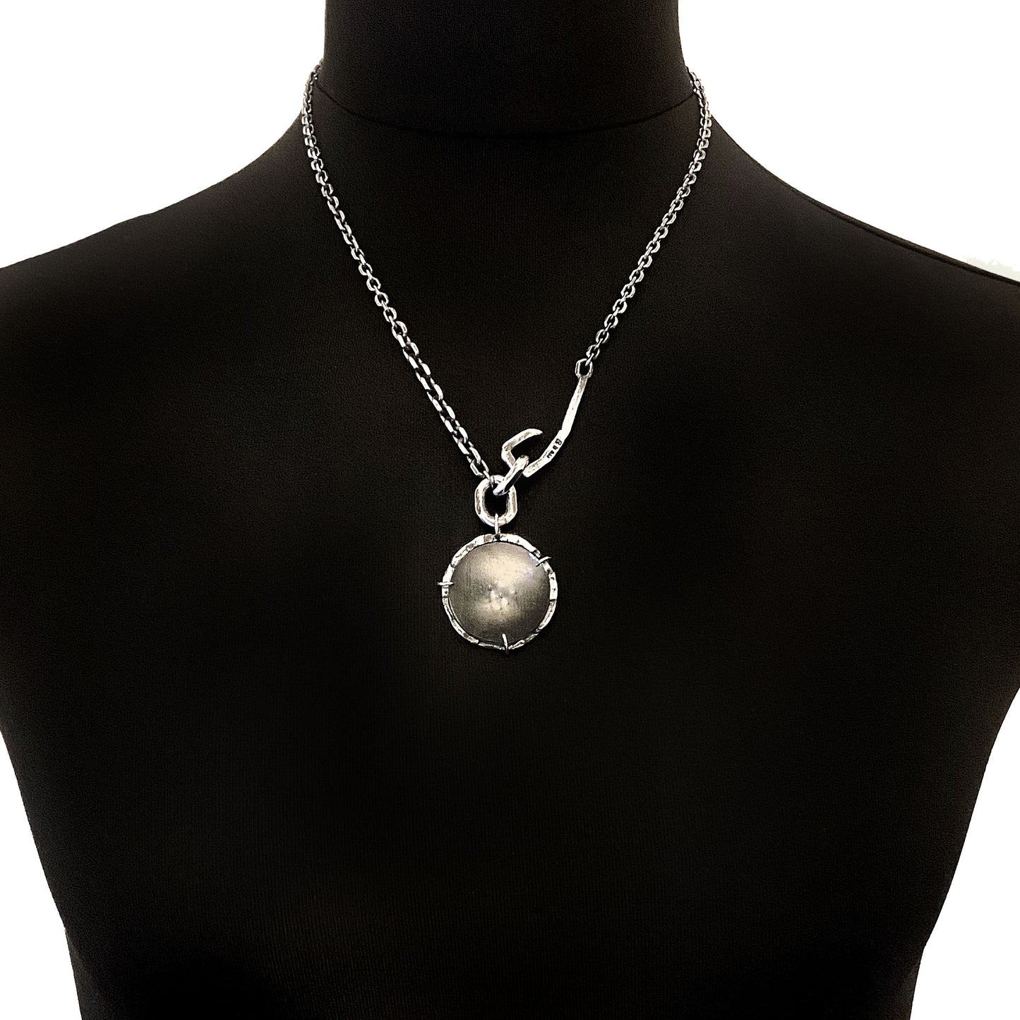 Magnifying glass silver pendant