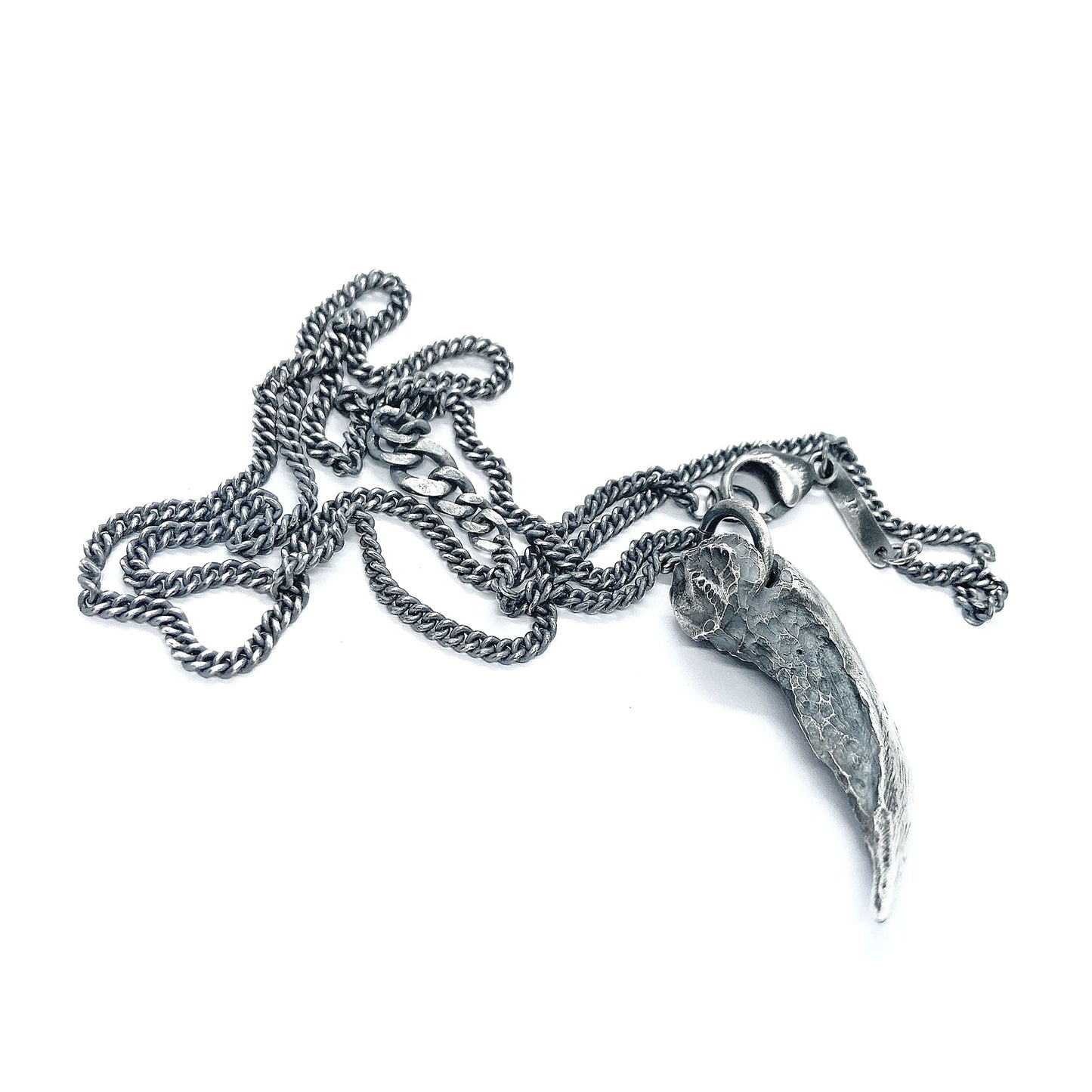 Silver claw pendant