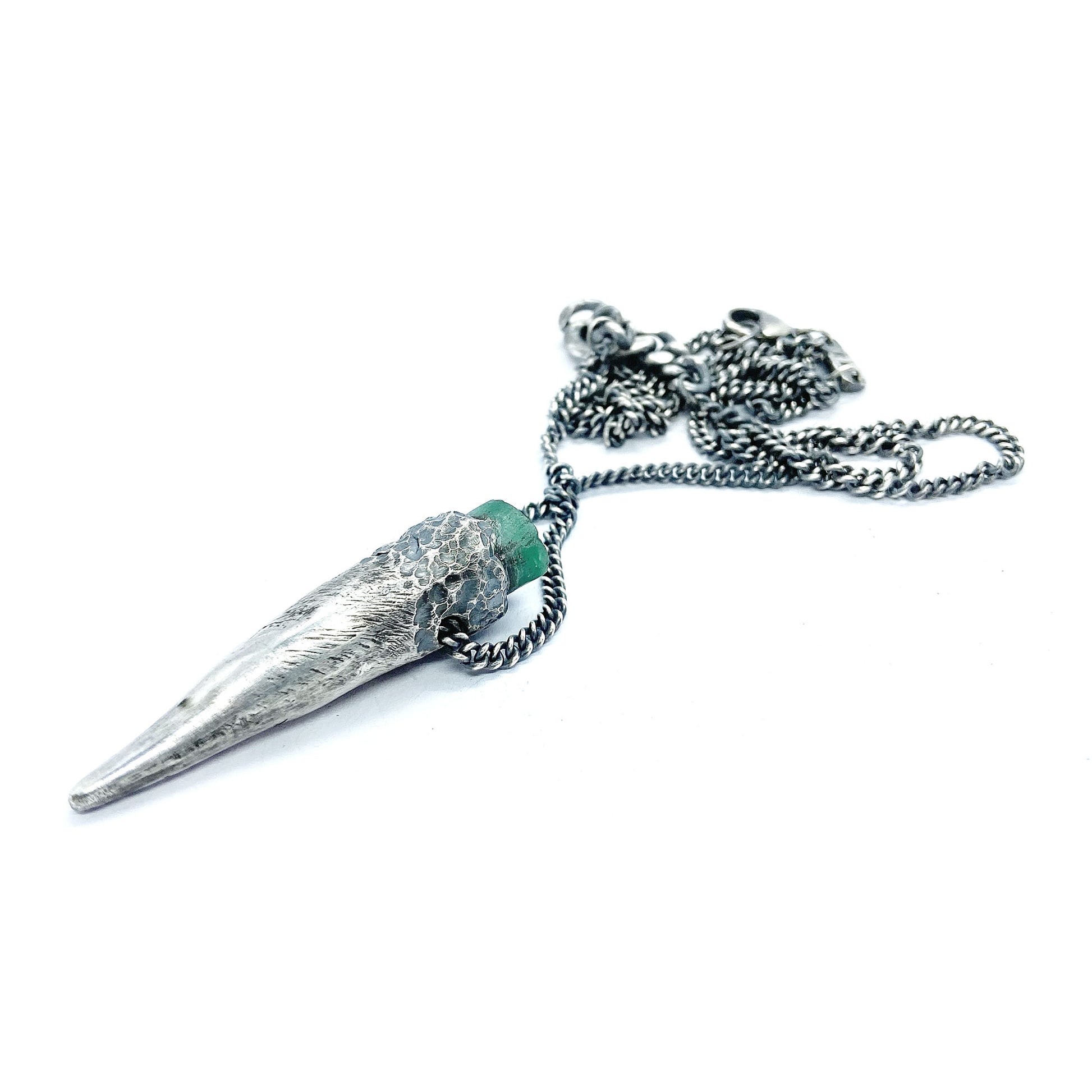 Silver and emerald pendant