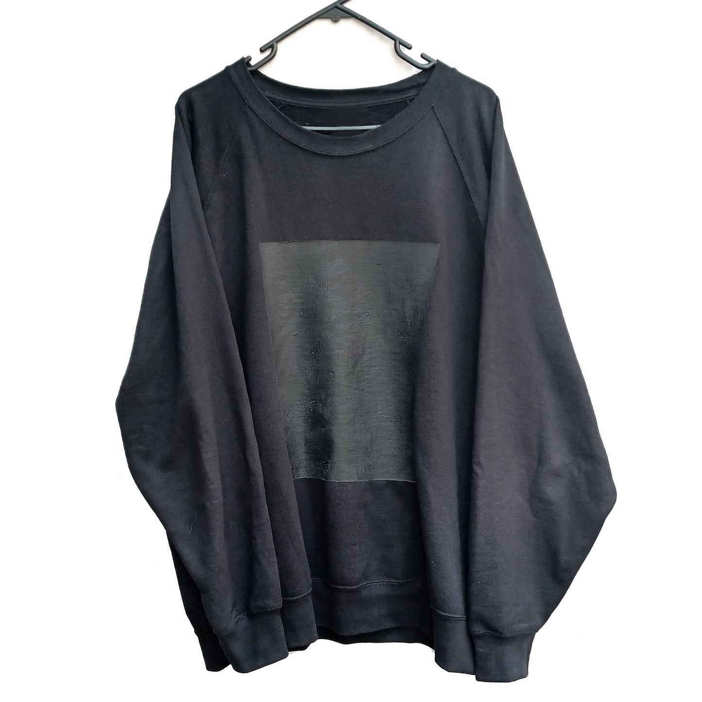 Black raglan sleeve sweatshirt. Latex print